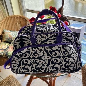Large travel bag w/wheels, handle, shoulder strap